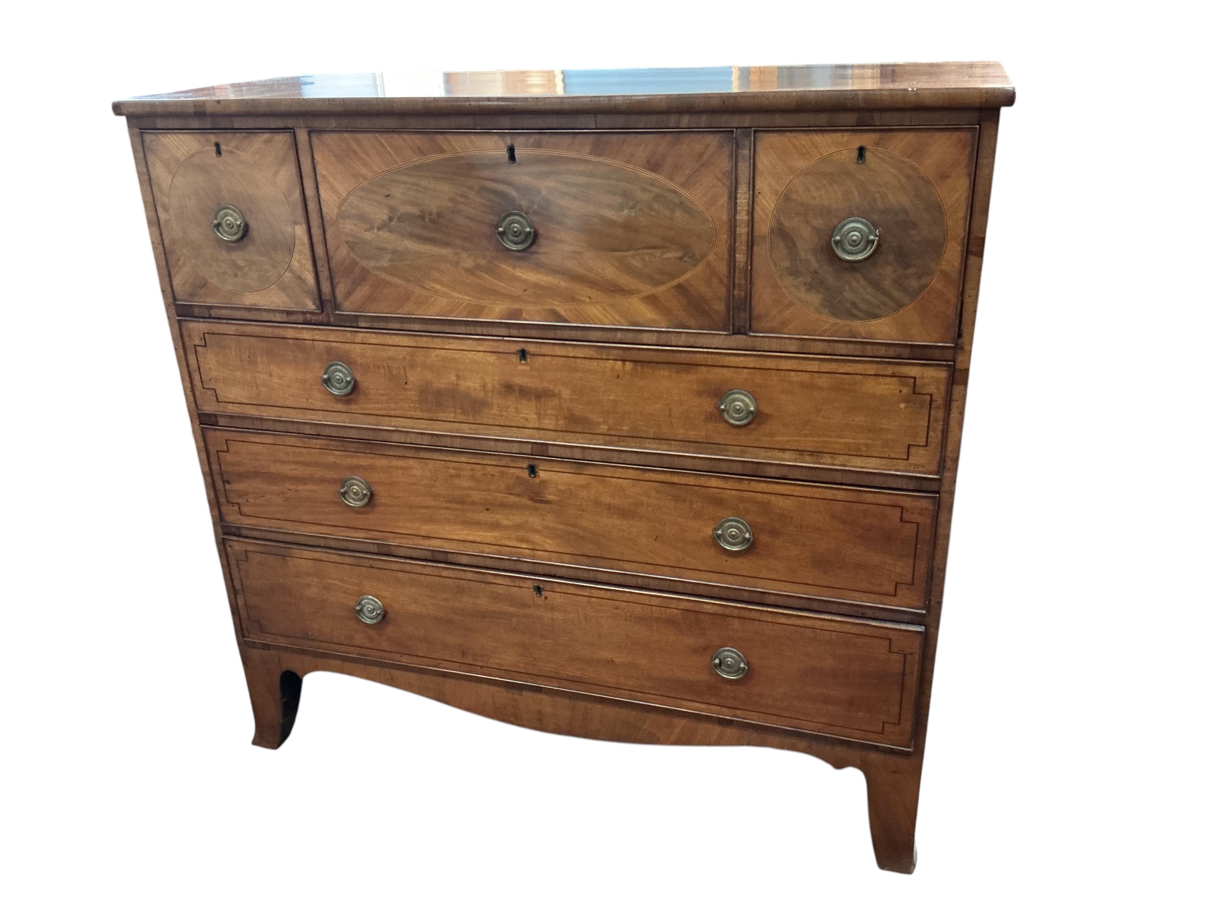 A George IV inlaid mahogany secretaire chest, width 124cm, depth 56cm, height 118cm